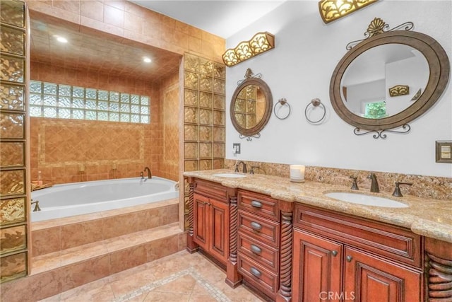 18750 Keswick St, Reseda, CA 91335 - bathroom featuring inlaid floor details, double vanity, a garden tub, tile patterned floors, and recessed lighting