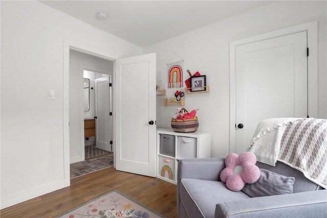 2410 Exposition Pl, Los Angeles, CA 90018 - bedroom with wood finished floors and baseboards