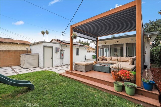 2410 Exposition Pl, Los Angeles, CA 90018 - wooden terrace featuring an outdoor hangout area and an outdoor structure