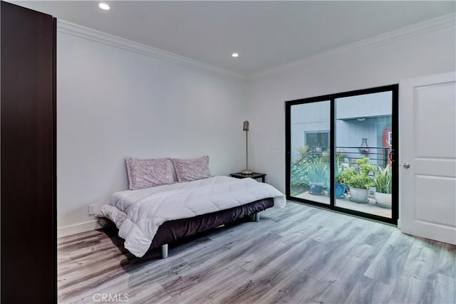bedroom featuring crown molding, recessed lighting, wood finished floors, and access to exterior