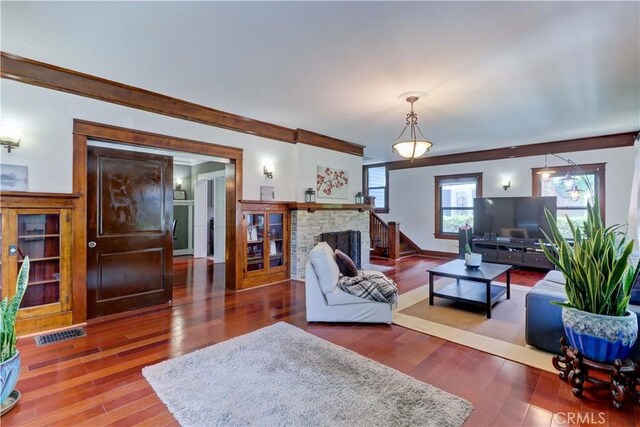 223 N St Andrews Pl, Los Angeles, CA 90004 - living area featuring wood finished floors and a brick fireplace