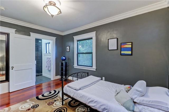 223 N St Andrews Pl, Los Angeles, CA 90004 - bedroom with wood finished floors, crown molding, and ensuite bath