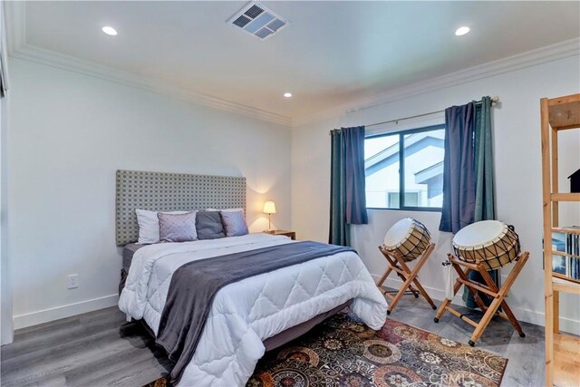 223 N St Andrews Pl, Los Angeles, CA 90004 - bedroom featuring wood finished floors, ornamental molding, and recessed lighting