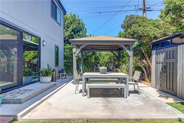 223 N St Andrews Pl, Los Angeles, CA 90004 - view of patio featuring a gazebo and outdoor dining area