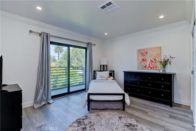 223 N St Andrews Pl, Los Angeles, CA 90004 - bedroom with access to outside, wood finished floors, ornamental molding, and recessed lighting