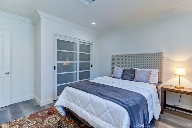 223 N St Andrews Pl, Los Angeles, CA 90004 - bedroom featuring wood finished floors, ornamental molding, and recessed lighting
