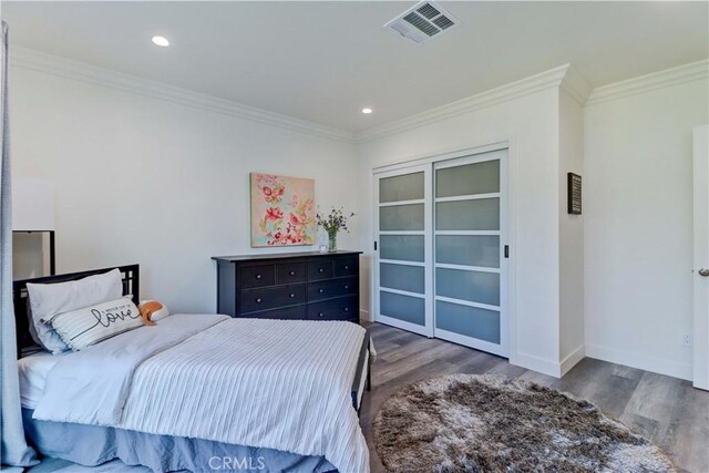 223 N St Andrews Pl, Los Angeles, CA 90004 - bedroom featuring wood finished floors, ornamental molding, and recessed lighting