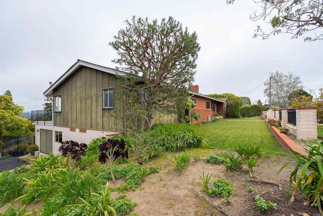 557 Canyon Dr, Solana Beach, CA 92075 - view of home's exterior featuring a yard, board and batten siding, and a balcony