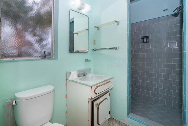 557 Canyon Dr, Solana Beach, CA 92075 - full bathroom with a tile shower, toilet, and vanity