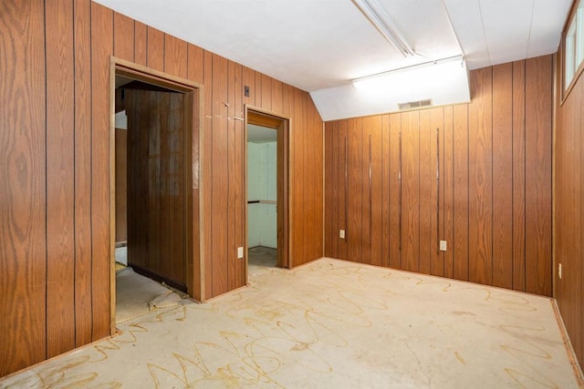 557 Canyon Dr, Solana Beach, CA 92075 - unfurnished room with wooden walls and vaulted ceiling