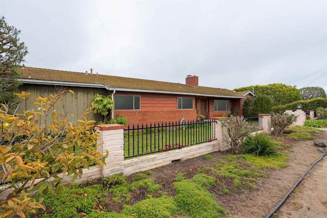 557 Canyon Dr, Solana Beach, CA 92075 - view of front facade featuring a chimney and brick siding