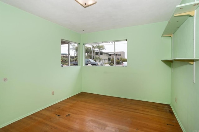 557 Canyon Dr, Solana Beach, CA 92075 - spare room with wood finished floors and baseboards