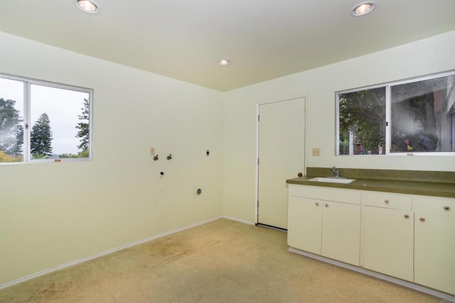 557 Canyon Dr, Solana Beach, CA 92075 - kitchen featuring a sink, dark countertops, light carpet, recessed lighting, and baseboards