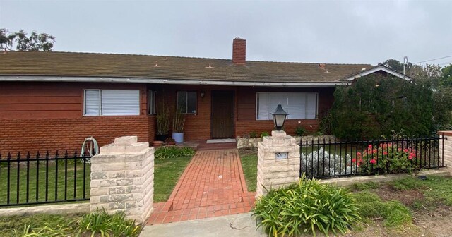557 Canyon Dr, Solana Beach, CA 92075 - single story home with a chimney