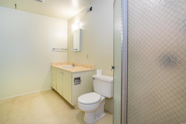 557 Canyon Dr, Solana Beach, CA 92075 - full bathroom featuring toilet, baseboards, vanity, and a shower