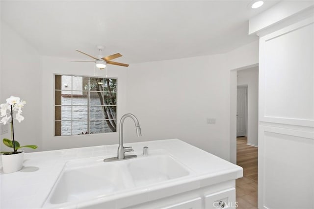 bathroom featuring vanity, ceiling fan, and recessed lighting