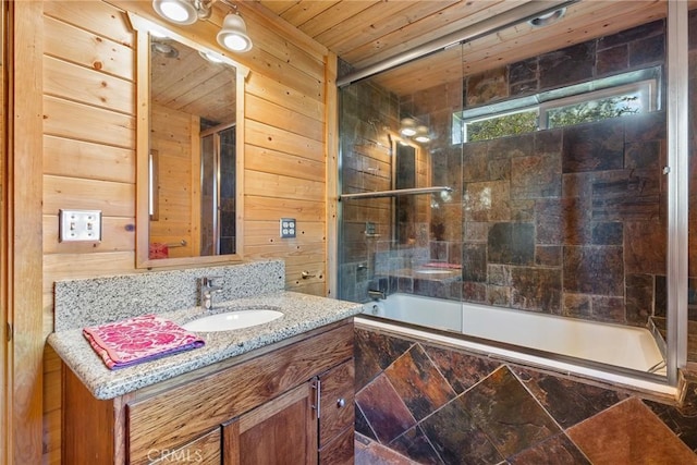 12352 Centerville Rd, Chico, CA 95928 - full bath featuring wood ceiling, tiled shower / bath combo, vanity, and wooden walls