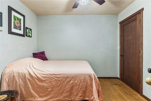 12352 Centerville Rd, Chico, CA 95928 - bedroom with wood finished floors, baseboards, and ceiling fan