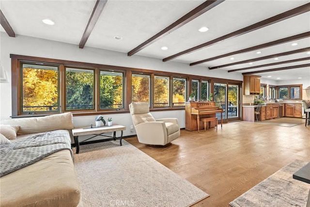 12352 Centerville Rd, Chico, CA 95928 - living room featuring beamed ceiling, recessed lighting, and light wood-type flooring
