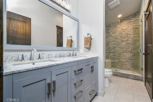 2447 Stonyvale Rd, Tujunga, CA 91042 - bathroom featuring double vanity, a stall shower, tile patterned floors, and recessed lighting