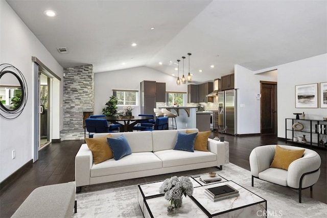 2447 Stonyvale Rd, Tujunga, CA 91042 - living area featuring vaulted ceiling, dark wood-type flooring, and recessed lighting