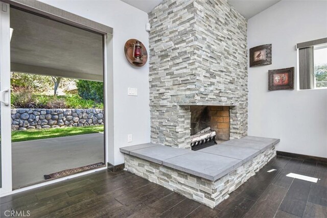 2447 Stonyvale Rd, Tujunga, CA 91042 - living room featuring wood finished floors and a fireplace