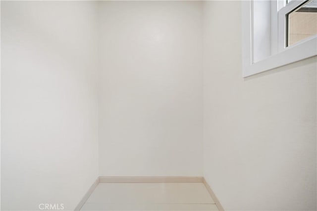 interior space with baseboards