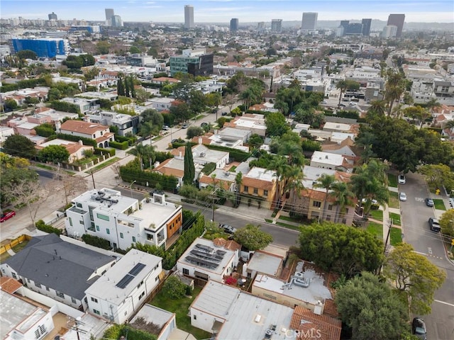 birds eye view of property with a view of city