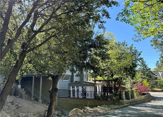 27596 N Bay Rd, Lake Arrowhead, CA 92352 - rear view of house featuring a playground