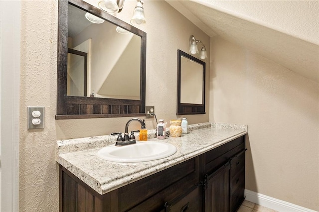 27596 N Bay Rd, Lake Arrowhead, CA 92352 - bathroom featuring vanity, tile patterned flooring, and a textured wall