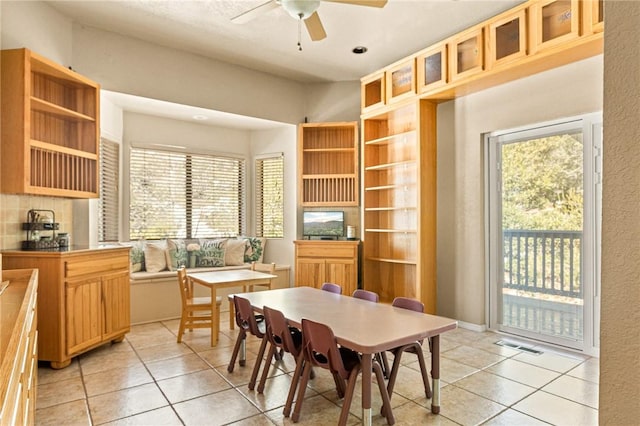 27596 N Bay Rd, Lake Arrowhead, CA 92352 - dining room featuring light tile patterned floors and a ceiling fan
