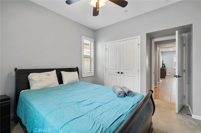 21730 Bene Dr, Saugus, CA 91350 - bedroom featuring a closet, ceiling fan, light colored carpet, and baseboards