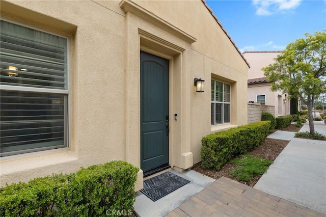 21730 Bene Dr, Saugus, CA 91350 - entrance to property featuring fence and stucco siding