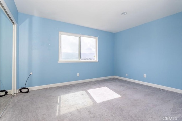 28414 Winterdale Dr, Canyon Country, CA 91387 - spare room featuring carpet floors and baseboards