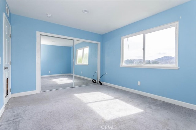 28414 Winterdale Dr, Canyon Country, CA 91387 - unfurnished bedroom featuring baseboards, carpet, and a closet