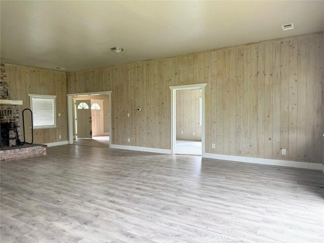 47409 Thunderhill Ln, Squaw Valley, CA 93675 - unfurnished living room featuring wood walls and wood finished floors