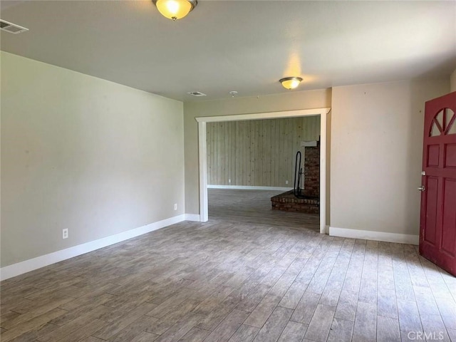 47409 Thunderhill Ln, Squaw Valley, CA 93675 - spare room with wood finished floors and a wood stove