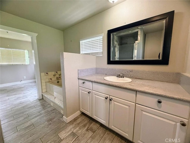 47409 Thunderhill Ln, Squaw Valley, CA 93675 - bathroom featuring wood finished floors, vanity, and a bath