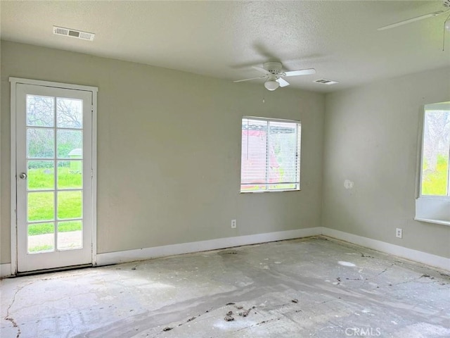 47409 Thunderhill Ln, Squaw Valley, CA 93675 - unfurnished room with a ceiling fan, plenty of natural light, and a textured ceiling