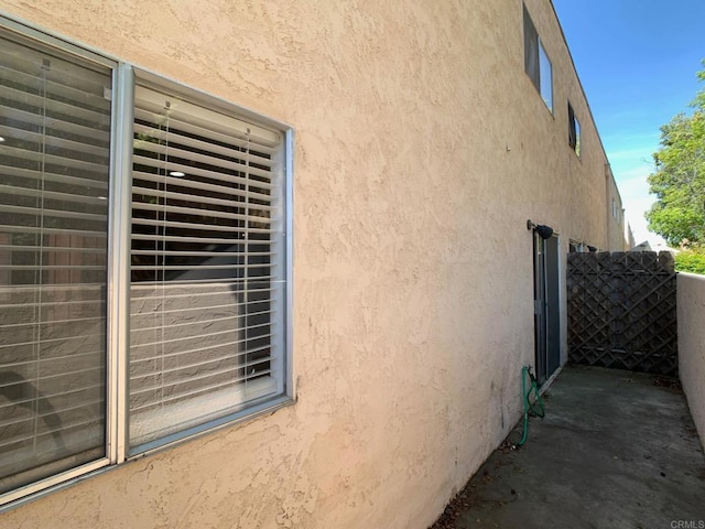 438 S Anza St, El Cajon, CA 92020 - view of property exterior featuring fence and stucco siding