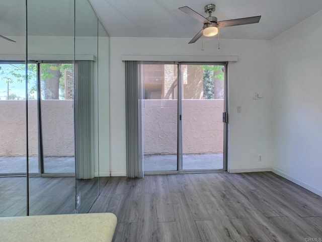 438 S Anza St, El Cajon, CA 92020 - empty room featuring wood finished floors, a ceiling fan, and baseboards