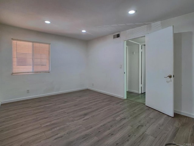 438 S Anza St, El Cajon, CA 92020 - unfurnished room featuring wood finished floors, visible vents, recessed lighting, and baseboards