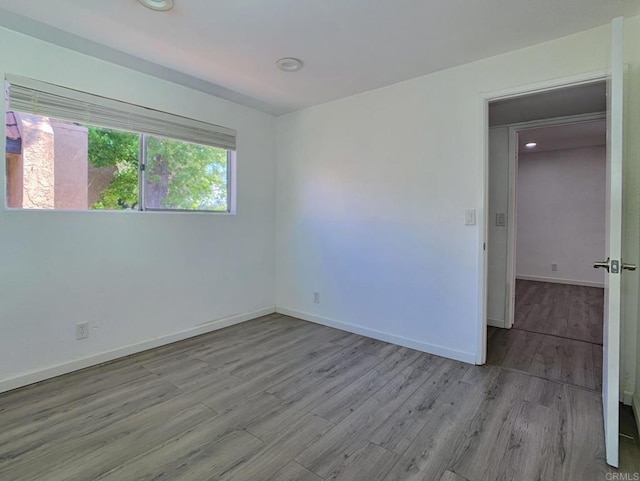438 S Anza St, El Cajon, CA 92020 - unfurnished room featuring wood finished floors and baseboards