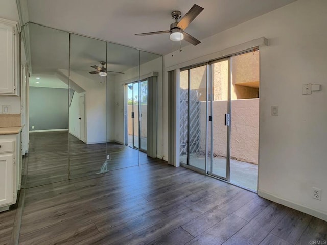 438 S Anza St, El Cajon, CA 92020 - spare room with baseboards, a ceiling fan, and dark wood-style flooring
