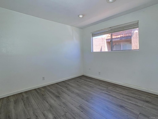 438 S Anza St, El Cajon, CA 92020 - empty room featuring baseboards, recessed lighting, and wood finished floors