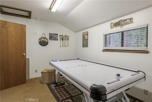 playroom featuring carpet and vaulted ceiling