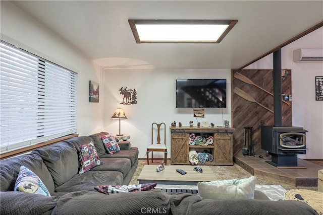 living room featuring an AC wall unit