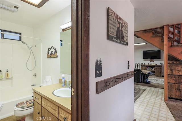 full bathroom with tub / shower combination, toilet, and vanity