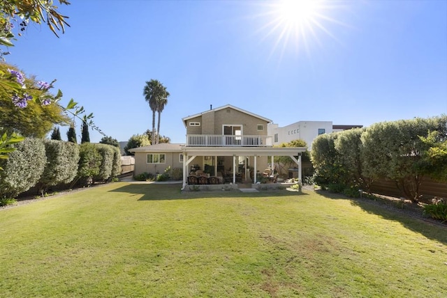 2422 Chatsworth Blvd, Point Loma, CA 92106 - rear view of property with a patio area, stucco siding, fence, a balcony, and a lawn