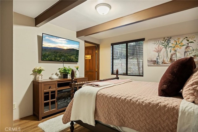 31353 Lightfoot Way, Running Springs, CA 92382 - bedroom with wood finished floors and beamed ceiling